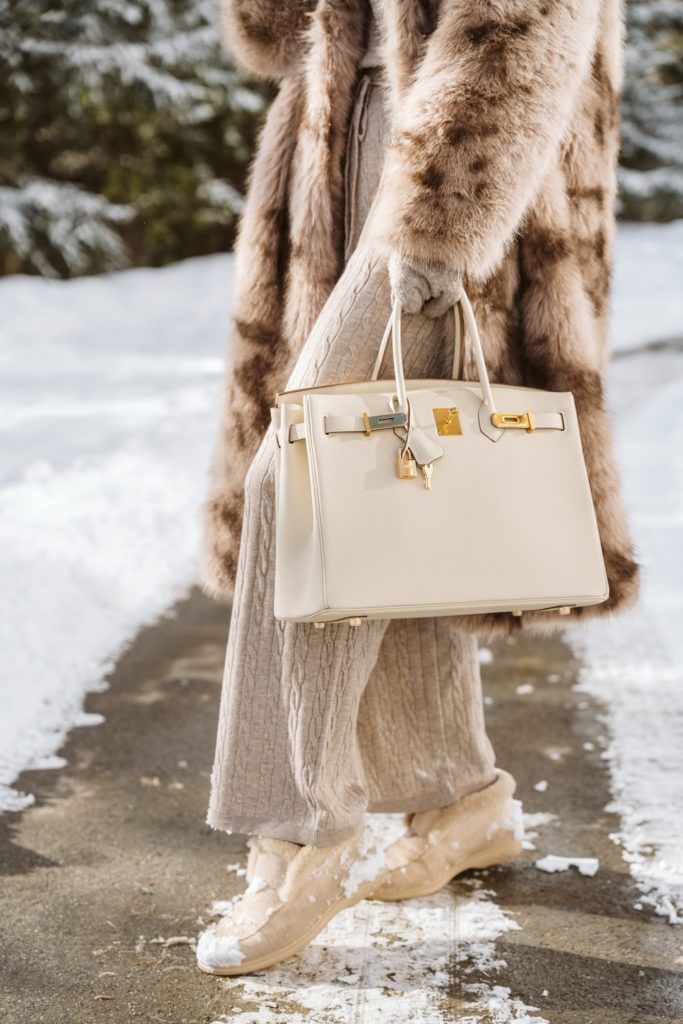 Luxury winter fashion detail during a portrait shoot in St. Moritz